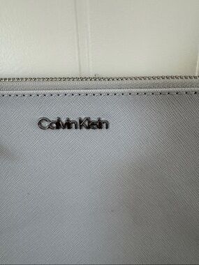 Calvin Klein Light Blue Saffiano Zip Pouch with Silver Logo